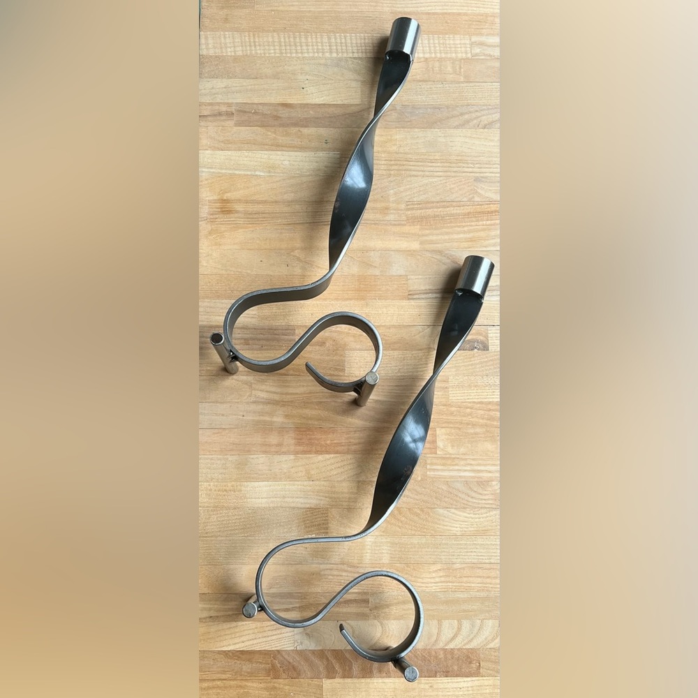 Artisan twisted ribbon steel pair of candle holders